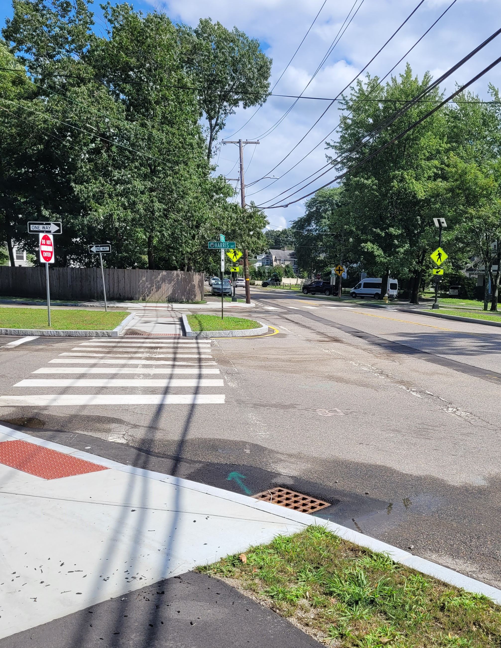 harris avenue at dedham avenue geometric changes to narrow road with protected pedestrian crossing